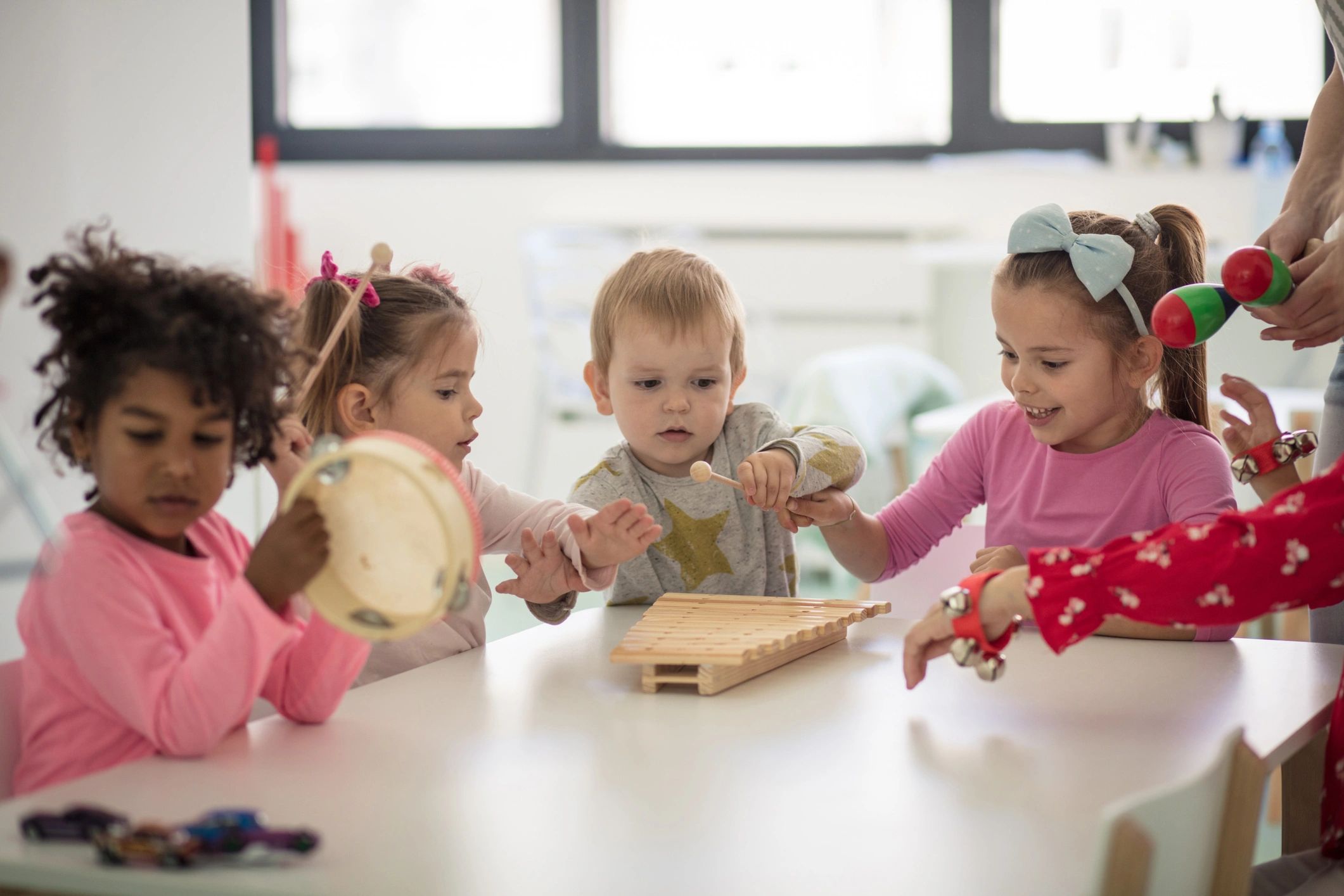Preschool children engaged in music and group activity
