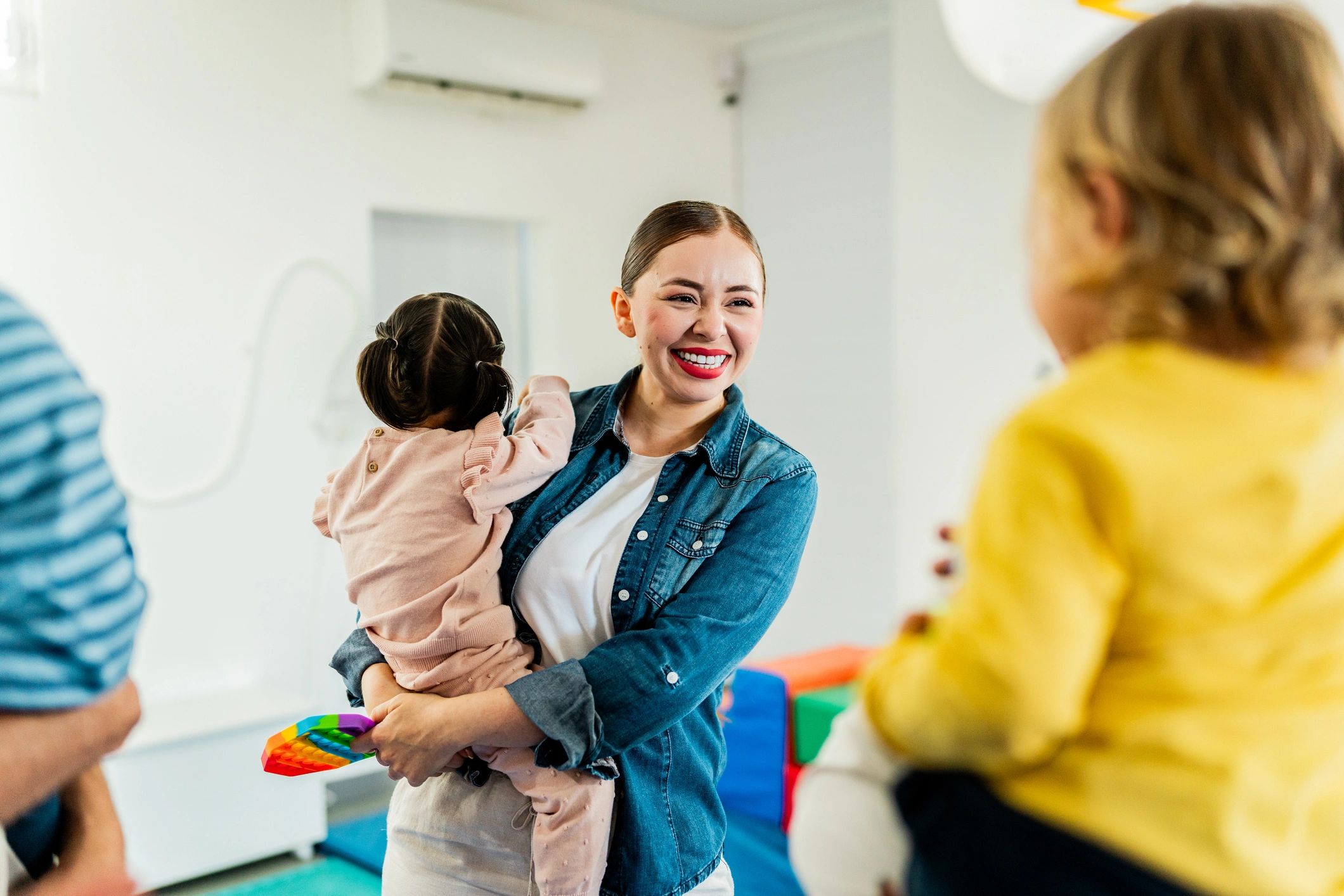 Infant care environment with caregiver and baby